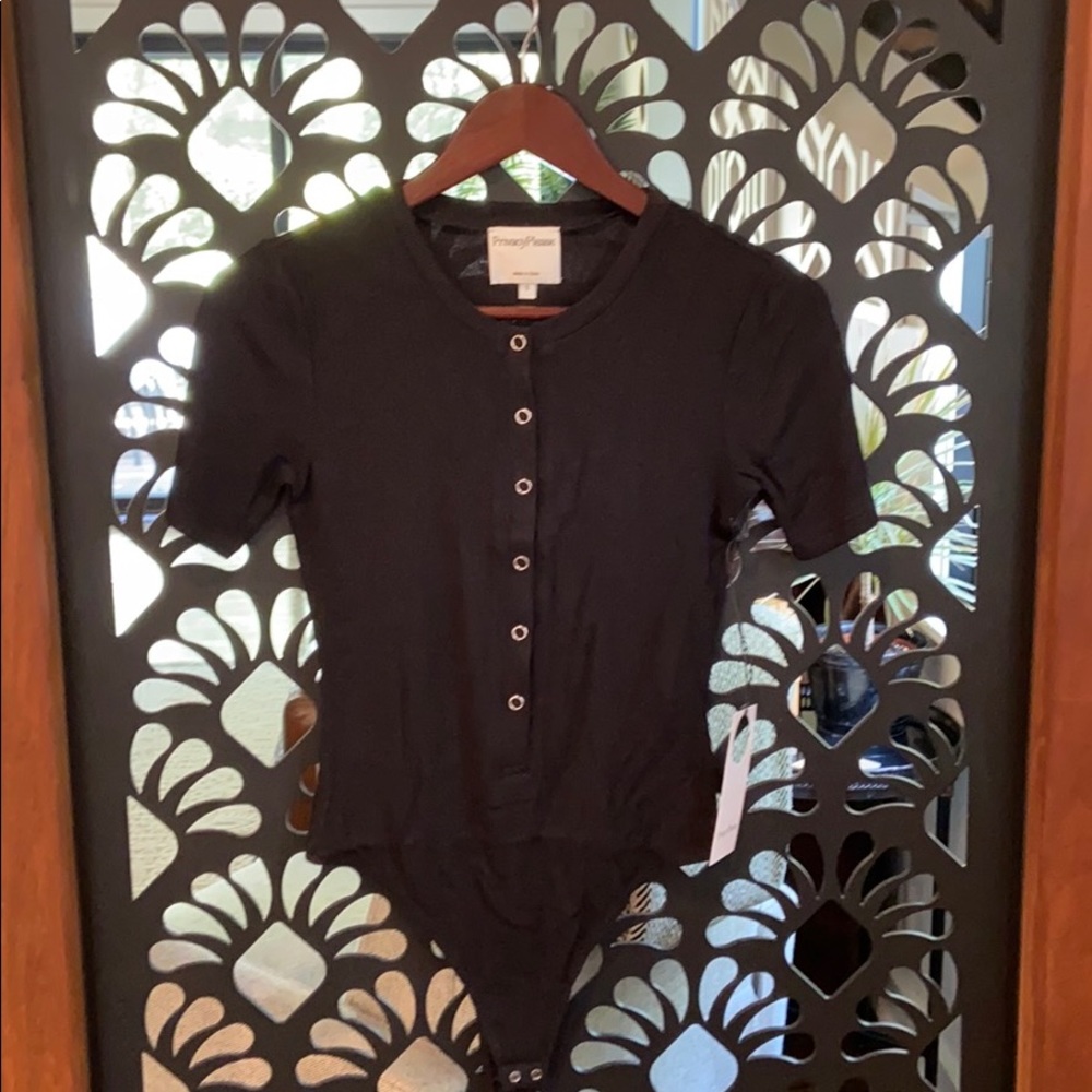 Short sleeve button up one piece